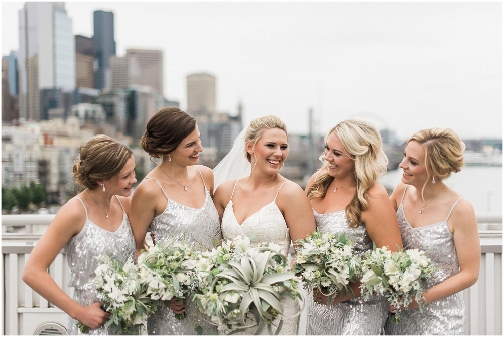 Photography: B. Jones Photography // Event Planning: Wishes! Wedding Coordination // Floral Design: Bella Fiori // Event Venue: World Trade Center Seattle DJ: DJ Headsmile // Cake Design: Honey Crumb Cake Studio - Bridal bouquet designed by Alicia Schwede of Bella Fiori. Bouquet of tillandsia air plant, grey dusty miller,  white scabiosa, sweet peas, white veronica, seeded eucalyptus. 