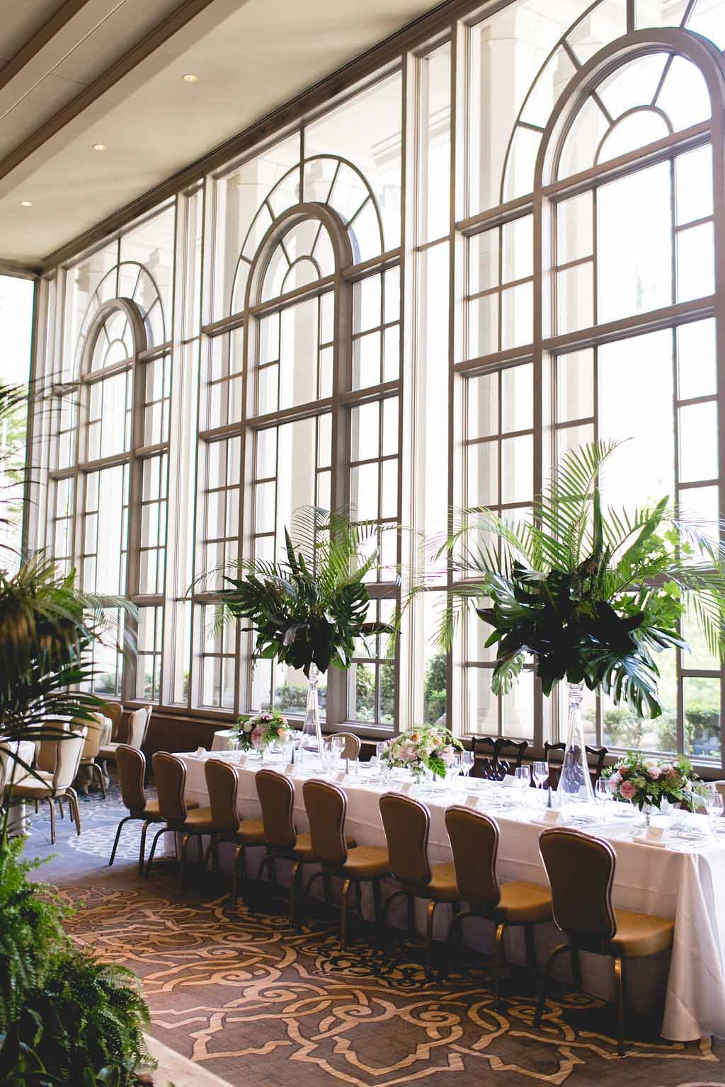 Bella Fiori, Seattle Wedding Florist, Fairmont Olympic Hotel - Garden Room Reception with large centerpieces of all greenery and tropical leaves
